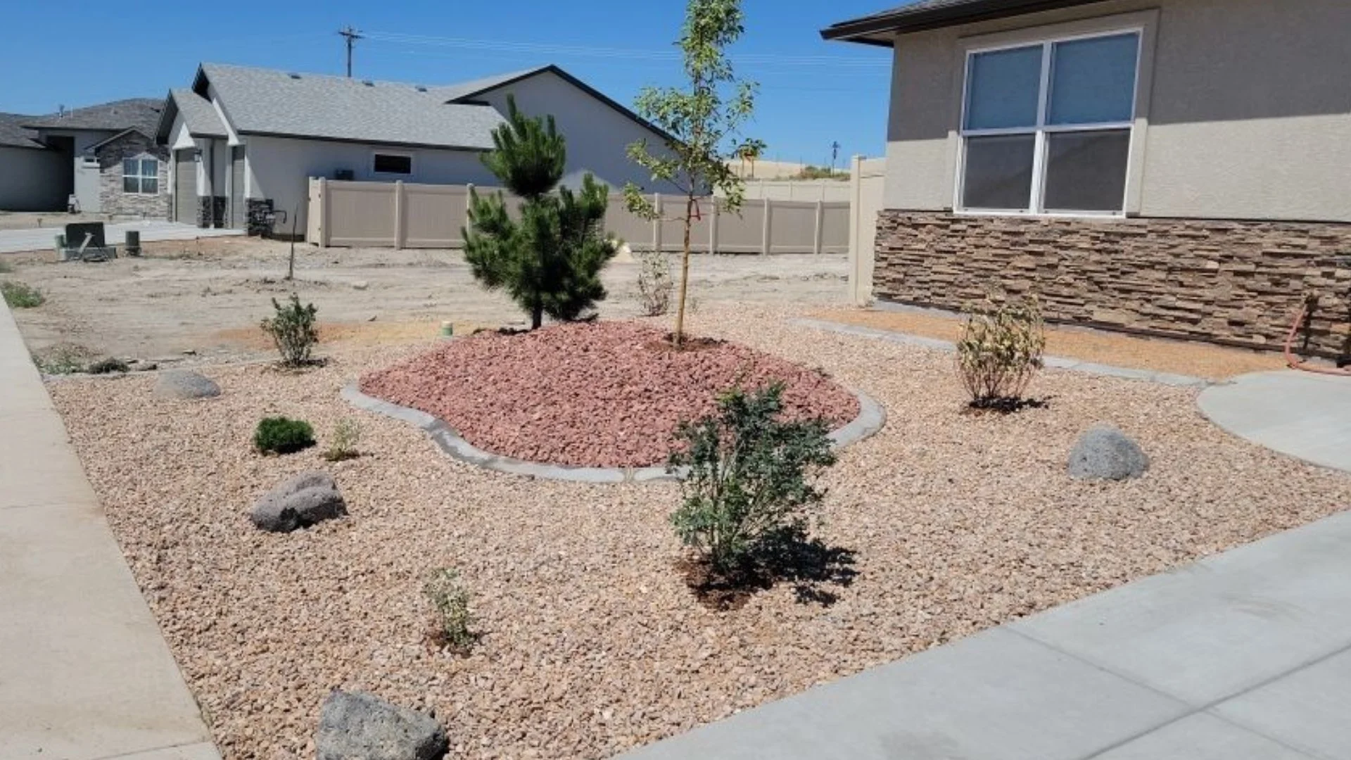 Make Your Property More Desert-Friendly by Replacing Grass With Rocks!